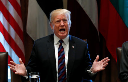 U.S. President Donald Trump speaks while hosting Lithuanian President Dalia Grybauskaite, Estonian President Kersti Kaljulaid, and Latvian President Raimonds Vejonis for the Baltic Summit at the White House in Washington, D.C., U.S., April 3, 2018. REUTERS/Kevin Lamarque - RC1ADE3E96C0