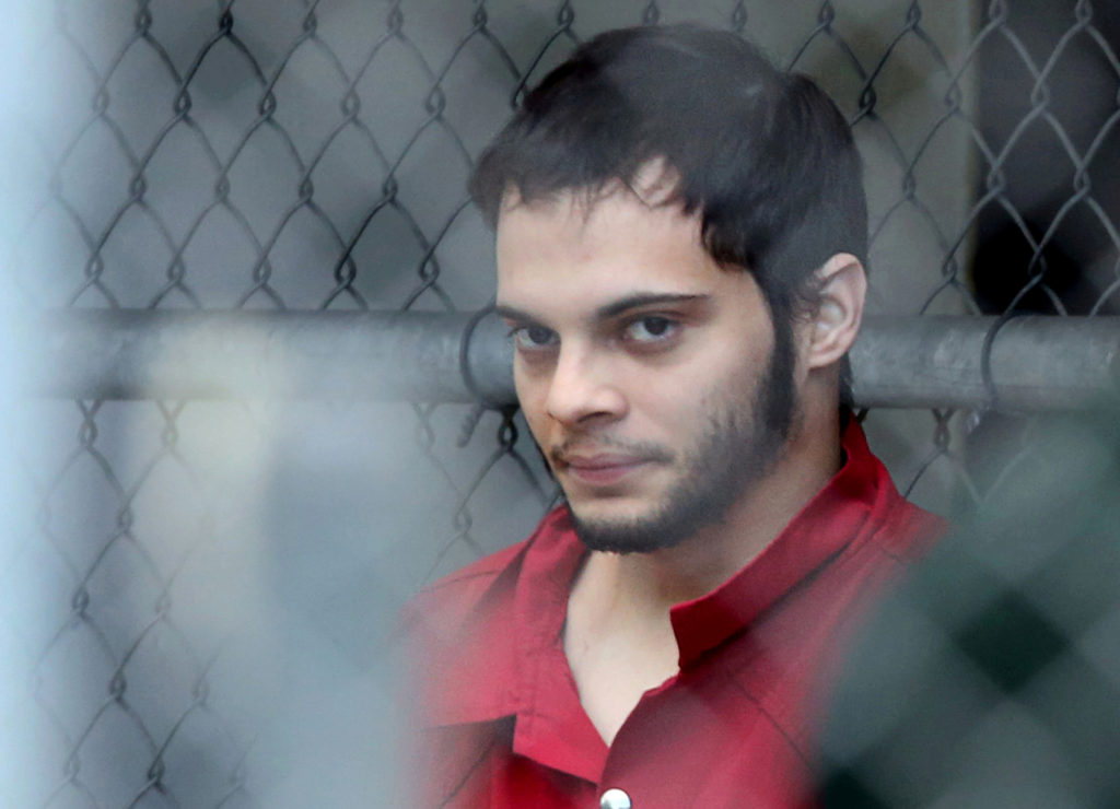 FILE PHOTO - Esteban Santiago is taken from the Broward County main jail as he is transported to the federal courthouse in...