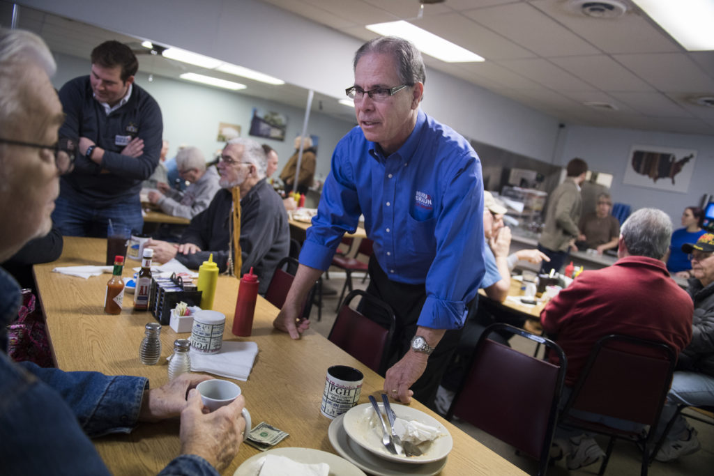 UNITED STATES - APRIL 4: Mike Braun, who is running for the Republican nomination for Senate in Indiana, talks with patron...