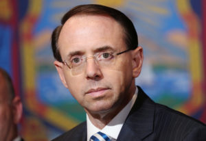 Deputy Attorney General Rod Rosenstein appears with President Donald Trump at a roundtable on immigration and the gang MS-13 at the Morrelly Homeland Security Center in Bethpage, New York. Photo by Kevin Lamarque/Reuters