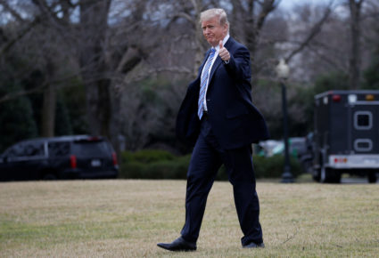 U.S. President Donald Trump walks to Marine One to depart for travel to Florida from the South Lawn of the White House in Washington, U.S., February 16, 2018. REUTERS/Leah Millis