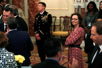 Central Intelligence Agency (CIA) director nominee Gina Haspel (R) attends Secretary of State Mike Pompeo's ceremonial swearing-in at the State Department in Washington, D.C. Photo by Jonathan Ernst/Reuters