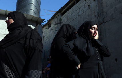 A relative of a Palestinian, who was killed during a protest at the Israel-Gaza border, mourns during his funeral in Khan Younis in the southern Gaza Strip. Photo by Ibraheem Abu Mustafa/Reuters