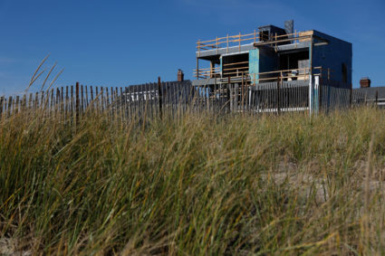 A house is seen under a construction in the Belle Harbour section of the Queens borough that was damage by Hurricane Sandy in New York, U.S., October 27, 2017. REUTERS/Shannon Stapleton - RC159E777C00