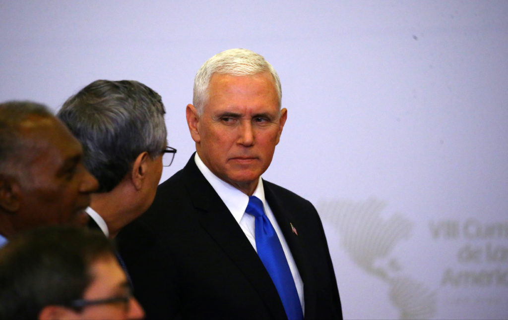 Vice President Mike Pence attends the family photo of the VIII Summit of the Americas in Lima, Peru. Photo by Ivan Alvarad...
