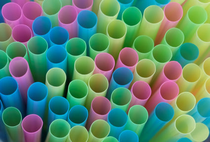 Drinking straws protrude from a glass in a illustration picture in Loughborough, Britain April 19, 2018. REUTERS/Darren Staples
