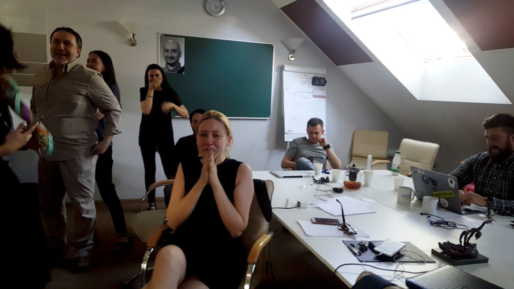 ATR journalists react to Russian journalist Arkady Babchenko's appearance during a news conference in Kiev, Ukraine on May 30 in this still image obtained from social media. Photo by Kateryna Lisunova/via Reuters