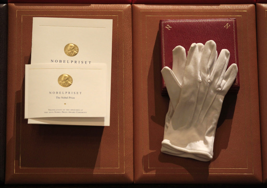 Prizes for the 2010 Nobel Prize winners are seen before the award ceremony at the Concert Hall in Stockholm. Photo by Pawe...