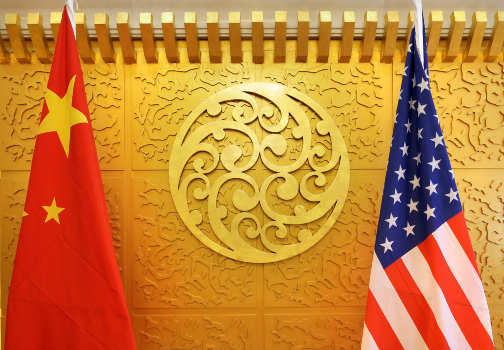 Chinese and U.S. flags are set up for a meeting during an April visit by U.S. Secretary of Transportation Elaine Chao at C...
