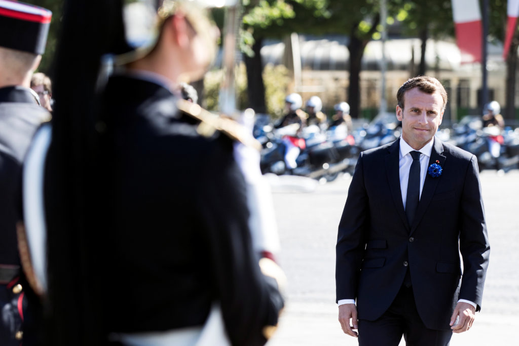 French President Emmanuel Macron attends a ceremony in front of the statue of Charles De Gaulle in Paris, France, May 8, 2...