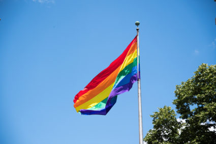 An gay pride flag waiving high in the air in Ontario, Canada. Photo by Roberto Machado Noa/LightRocket via Getty Images