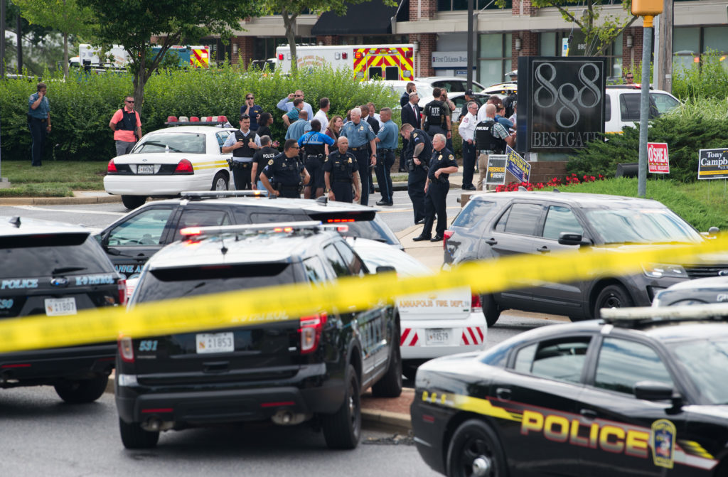News Wrap Annapolis newspaper shooting suspect in custody PBS News