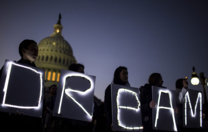 Demonstrators hold illuminated signs during a rally supporting the Deferred Action for Childhood Arrivals program (DACA), or the Dream Act, outside the U.S. Capitol building in Washington, D.C., U.S., on Thursday, Jan. 18, 2018. The House passed a spending bill Thursday to avoid a U.S. government shutdown, but Senate Democrats say they have the votes to block the measure in a bid to force Republicans and President Donald Trump to include protection for young immigrants.