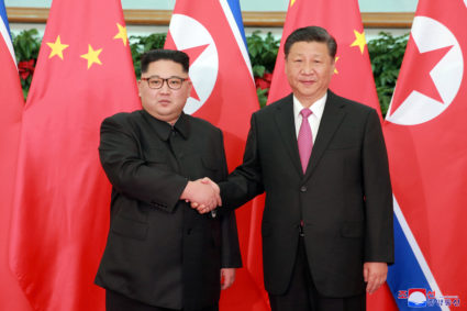 North Korean leader Kim Jong Un shakes hands with China's President Xi Jinping, in Dalian, China in this undated photo released on May 9, 2018 by North Korea's Korean Central News Agency (KCNA). Photo by KCNA via Reuters