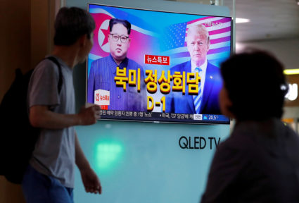 People watch a TV broadcasting a news report on the upcoming summit between the U.S. and North Korea, in Seoul, South Korea. Photo by Kim Hong-Ji/Reuters