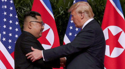 U.S. President Donald Trump shakes hands with North Korean leader Kim Jong Un at the Capella Hotel on Sentosa island in Singapore on June 12. Photo by Jonathan Ernst/Reuters