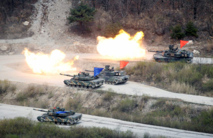 South Korean Army K1A1 and U.S. Army M1A2 tanks fire live rounds during a U.S.-South Korea joint live-fire military exercise, at a training field, near the demilitarized zone, separating the two Koreas in Pocheon, South Korea. Photo by Kim Hong-Ji/Reuters