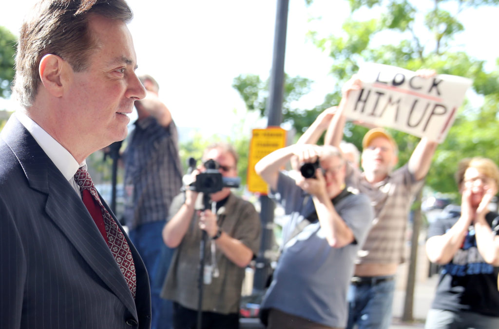 Former Trump campaign manager Paul Manafort arrives for arraignment on a third superseding indictment against him by Speci...