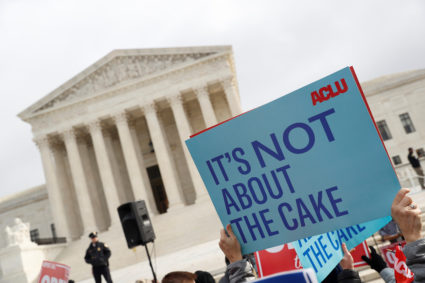 Demonstrators protest during oral arguments in the Masterpiece Cakeshop vs. Colorado Civil Rights Commission case at the Supreme Court in Washington, U.S., December 5, 2017. Photo by Aaron P. Bernstein/REUTERS