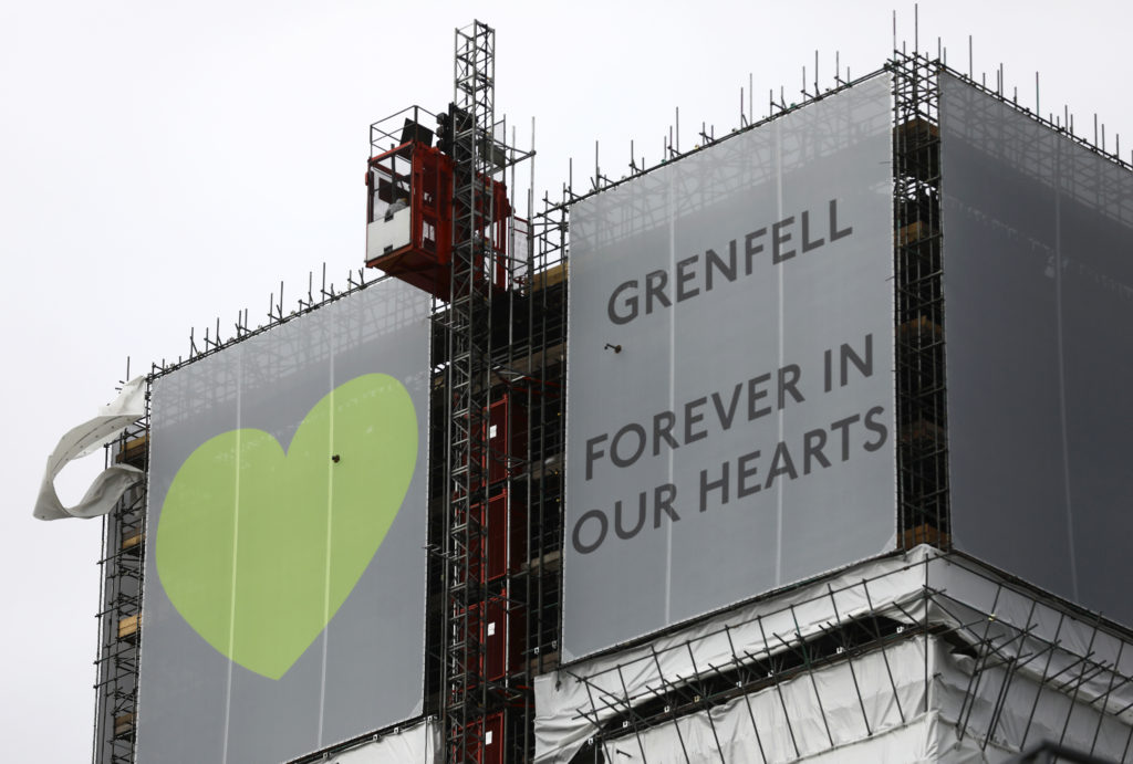 New hoarding covers the top of Grenfell Tower to mark the first anniversary of the fire that killed 71 people at the socia...