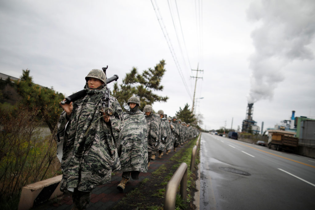 South Korean marines march during a military exercise as a part of the annual joint military training called Foal Eagle be...