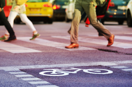 Pedestrian deaths jumped 27 percent from 2007 to 2016 while other U.S. traffic deaths dropped. Distracted walking, and alcohol consumption by drivers and pedestrians are contributing to the problem, federal data shows. Photo by Getty Images