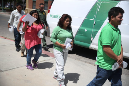 Migrant parents all of whom were separated from their children by U.S Customs and Border Patrol arrive at the Annunciation House migrant shelter after being released from U.S. Customs and Border Protection custody on June 24, 2018 in El Paso, Texas. Photo by Joe Raedle/Getty Images
