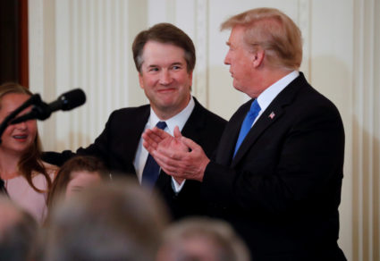 Supreme Court nominee Judge Brett Kavanaugh (left) stands with President Donald Trump in the East Room of the White House on July 9. Photo by Jim Bourg/Reuters