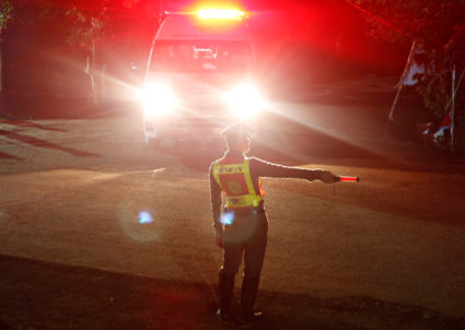 The last ambulance leaves from Tham Luang cave complex in the northern province of Chiang Rai, Thailand. Photo by Soe Zeya Tun/Reuters