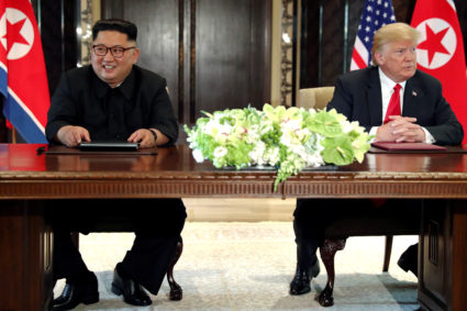 U.S. President Trump and North Korea's Kim hold a signing ceremony at the conclusion of their summit in Singapore