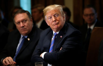 Secretary of State Mike Pompeo and President Donald Trump listen during a cabinet meeting at the White House in Washington, D.C. Photo by Leah Millis/Reuters