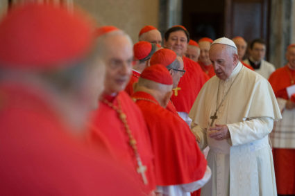 Pope Francis talks with cardinals during a July consistory meeting at the Vatican. Photo provided by the Vatican via Reuters