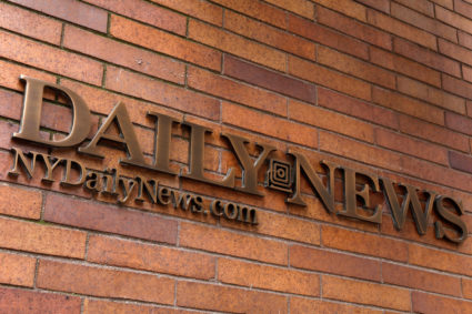 A sign is seen outside the offices of the New York Daily News newspaper in New York City after reports that the paper was reducing its editorial staff by some 50 percent in New York. Photo by Brendan McDermid/Reuters