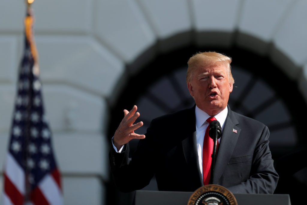 President Donald Trump speaks about the economy while delivering remarks on the South Lawn of the White House in Washingto...