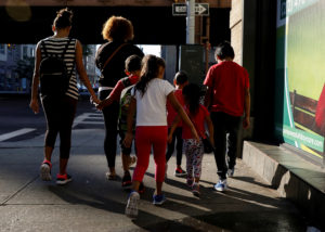 Children are escorted to the Cayuga Center, which provides foster care and other services to immigrant children separated from their families, in New York City, U.S., July 10, 2018. Photo by Brendan McDermid/Reuters