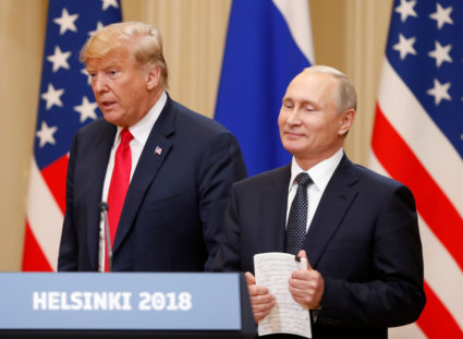 U.S. President Donald Trump and Russian President Vladimir Putin arrive for a joint news conference after their meeting in Helsinki, July 16, 2018. Photo by REUTERS/Grigory Dukor.
