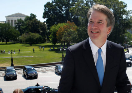 With the U.S. Supreme Court building in the background, Supreme Court nominee judge Brett Kavanaugh arrives prior to meeting with Senate Majority Leader Mitch McConnell on Capitol Hill in Washington, U.S., July 10, 2018. REUTERS/Joshua Roberts - RC1289DFD4F0