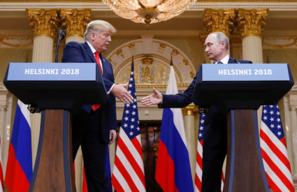 President Donald Trump and Russia's President Vladimir Putin shake hands during a joint news conference after their meeting in Helsinki, Finland. Photo by Kevin Lamarque/Reuters