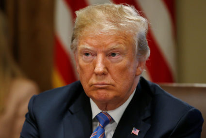 U.S. President Donald Trump listens during a cabinet meeting at the White House in Washington, U.S., July 18, 2018. Photo by REUTERS/Leah Millis