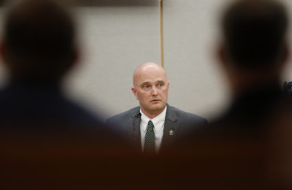 DALLAS, TEXAS - AUGUST 23: Fired Balch Springs police officer Roy Oliver, who is charged with the murder of 15-year-old Jordan Edwards, testifies with defense attorney Jim Lane during the sixth day of his trial at the Frank Crowley Courts Building in Dallas on Thursday, Aug. 23, 2018. (Photo by Rose Baca-Pool/Getty Images)