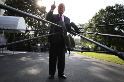 U.S. President Donald Trump talks to reporters as he departs the White House June 8, 2018 in Washington, DC. Trump is traveling to Canada to attend the G7 summit before heading to Singapore on Saturday for a planned U.S.-North Korea summit. (Photo by Chip Somodevilla/Getty Images)