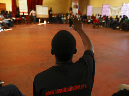 A participant takes part in a group session at a Youth Against AIDS training camp organised by the Jesuit AIDS Project in Domboshawa, around 80 km (49 miles) north-east of Harare, April 13, 2012. The Jesuit AIDS Project was launched in Harare in 1996 to fight the alarmingly high prevalence rate of HIV/AIDS in Zimbabwe and now focuses on prevention and youth development, according to organisers. Picture taken April 13, 2012. REUTERS/Darrin Zammit Lupi
