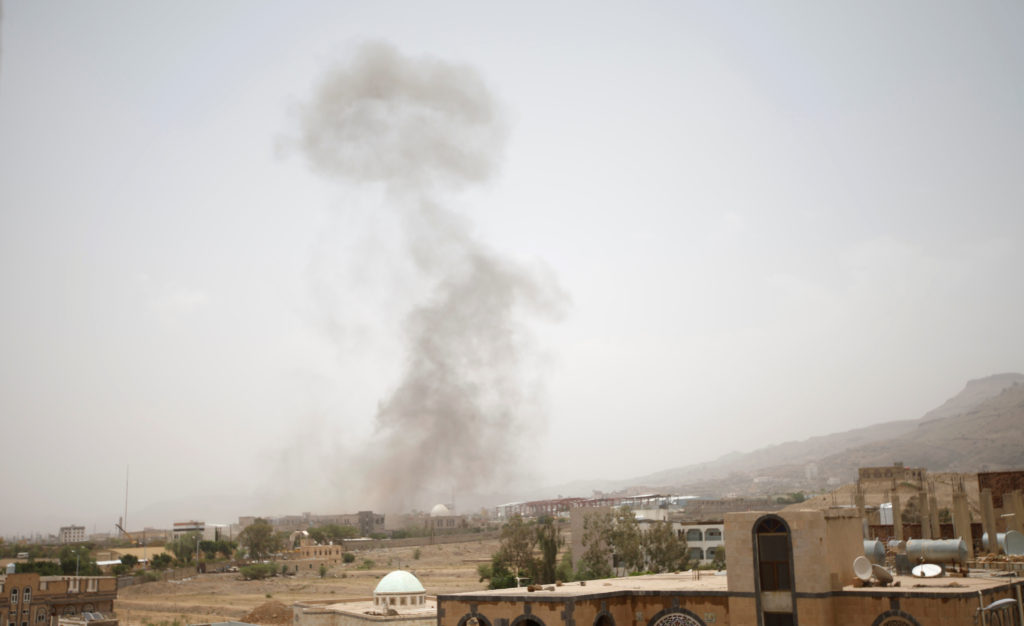 Smoke rises after an airstrike in Sanaa, Yemen on Aug. 9. Photo by Mohamed al-Sayaghi/Reuters