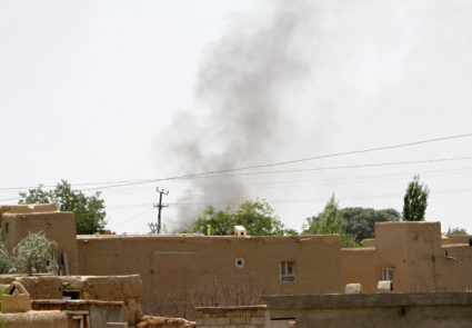 Smoke rises from a residential area where the Taliban fought with Afghan forces in Ghazni province, Afghanistan on Aug. 10. Photo by Reuters stringer