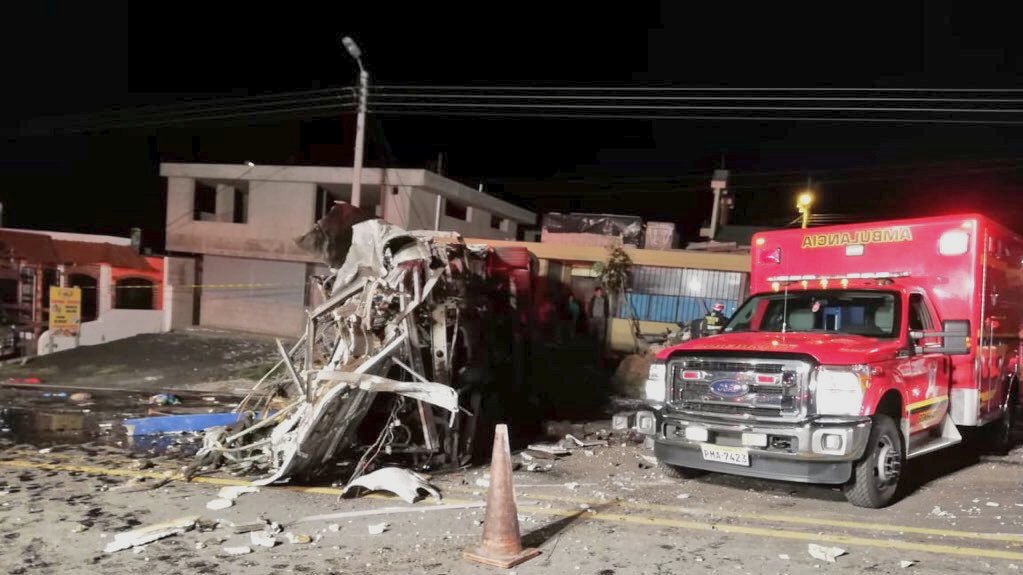 The wreckage of the bus is seen in Papallacta, Ecuador on Aug. 13 in this image obtained from social media by Reuters on A...