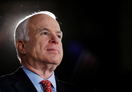 Republican presidential nominee Senator John McCain (R-Ariz.) listens as he is being introduced at a campaign rally in Denver, Colorado. Photo by Brian Snyder/Reuters