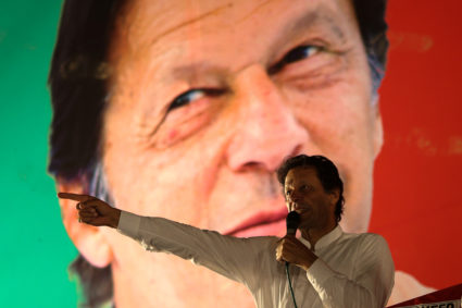 Imran Khan, chairman of the Pakistan Tehreek-e-Insaf (PTI) gestures while addressing his supporters during a July campaign meeting ahead of general elections in Islamabad, Pakistan. Photo by Athit Perawongmetha/Reuters