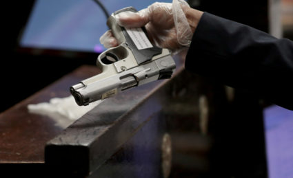 Jason Van Dyke's 9mm semiautomatic Smith and Wesson used in the killing of Laquan Mcdonald is introduced at the trial for the shooting death of McDonald at the Leighton Criminal Court Building in Chicago, Illinois, U.S., September 18, 2018. Photo by Antonio Perez/Chicago Tribune/Pool via REUTERS