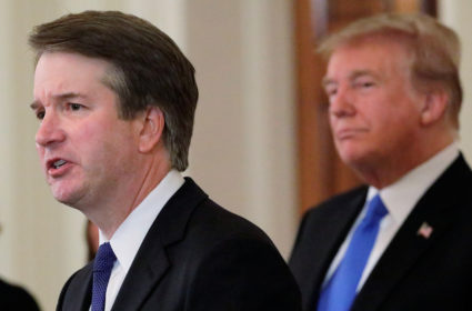 President Donald Trump listens to his nominee for the Supreme Court Brett Kavanaugh speak during his nomination announcement in the East Room of the White House in Washington, D.C. Photo by Jim Bourg/Reuters