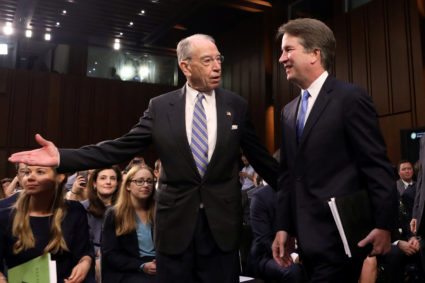 U.S. Supreme Court nominee judge Brett Kavanaugh arrives with Judiciary Committee Chairman Sen. Chuck Grassley (R-IA) for the second day of his confirmation hearing on Capitol Hill in Washington, U.S., September 5, 2018. Photo by Chris Wattie/Reuters